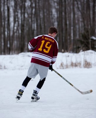 Steven skating on the pond in my late 70's jersey