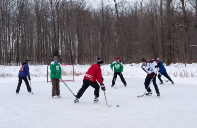The old guy has the puck