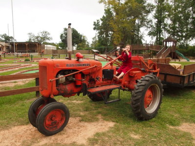 Helen on Tractor at 7 Acre Wood