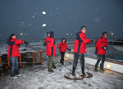 Night snow on the aft deck