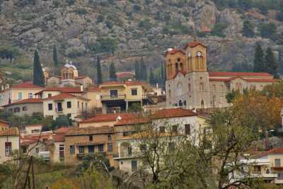 The city of Delphi perched lovingly in the lap of Mount Parnassus.