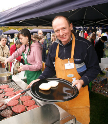 Alistair Maclennan from Balliefiurth Farm serves up the burgers at the farmers market.jpg