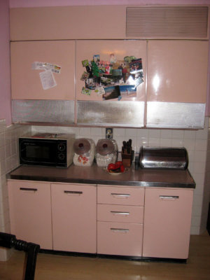 Pink GE kitchen with Wall fridge