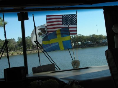 View of flags and lake from inside