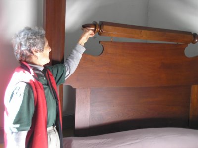 Rolling pin used to roll lumps out of feather bed