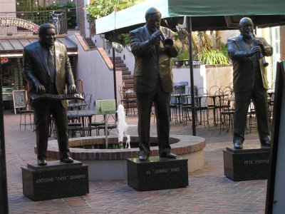 Statues in front of a restaurant
