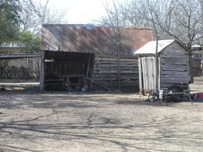  Back yard of old residence with original out-buildings