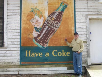 Antique Coke sign & Rolf