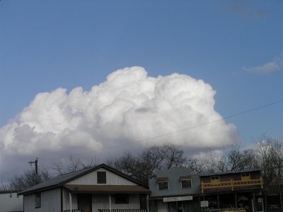 San Antonio, TX, fluffy white clouds one way