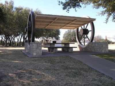 Texas Rest Stop/table shaded by wagonwheels.