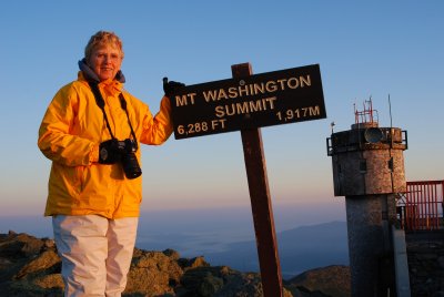 EduTrip member enjoying a solitary sunrise on the summit