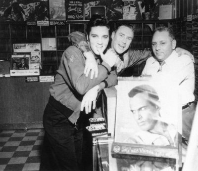 Elvis, Dewey Phillips and Joe Cuoghi at Pop Tunes