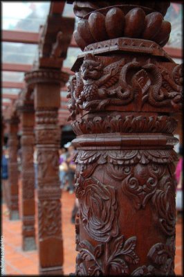 The building is made of intricatedly carved wood