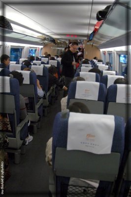 Crowded bullet train between Beijing and Tianjin on Mid Autumn Day, standing seats sold for the same price as sitting