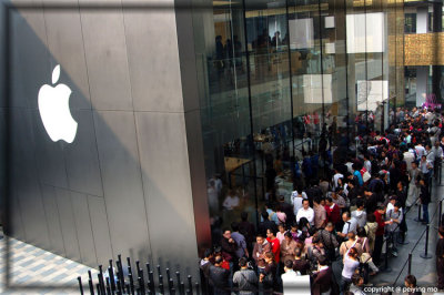 The line is very long and wraps the Apple building a few times