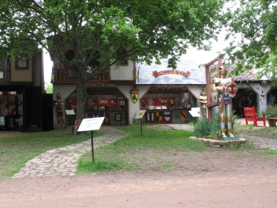 View from the street, 3 signs on each sidewalk