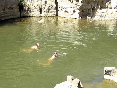 Christian and Keith having a swim in the river just outside the cave entrance