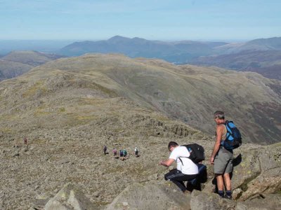 Descending north from summit of Bowfell, Skiddaw in the distance