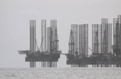 Jack-up drilling rigs parked off Port Gentil, Gabon