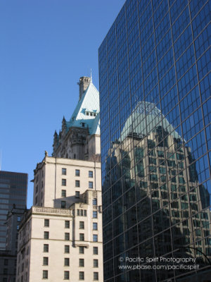 The Hotel Vancouver (1928-1939) paired with the reflection of the elegant Cathedral Place (1991)