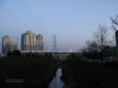 Still Creek with two Skytrains