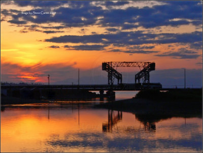 Sunset Cascades over the Chambers Creek bridge