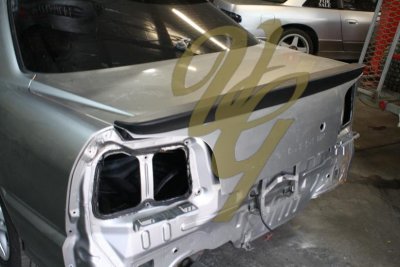 R34 4DR Boot Spoiler 02.JPG