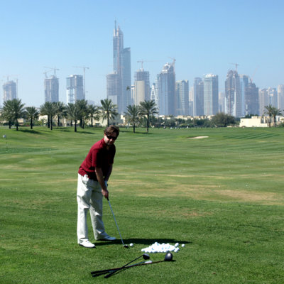 Golfing at the Montgomerie Dubai