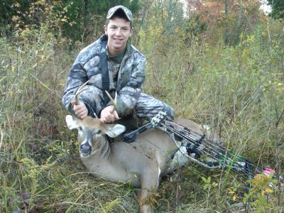 Conner  McIlrath with his first deer. Taken with a bow in Ripley County 10-2010