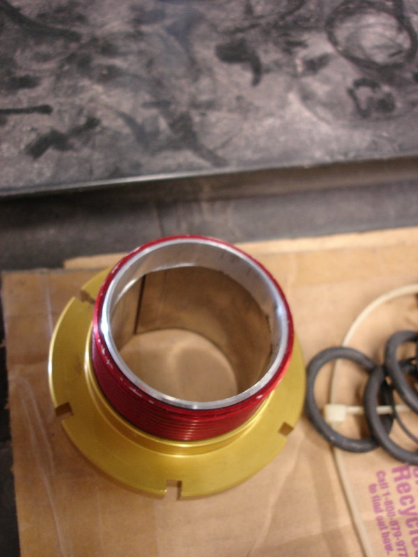 Assembled rear coilover sleeve