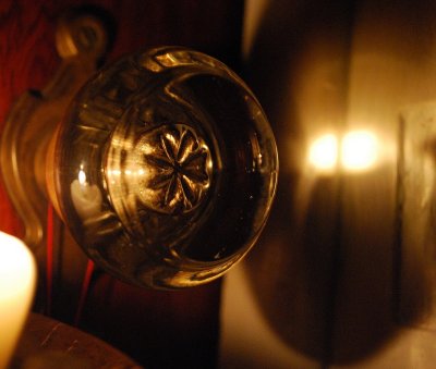 Candle, Doorknob, and Reflection