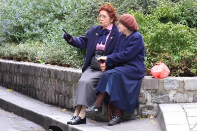 Two French women talking shop