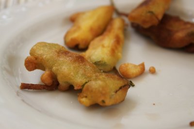 Deep fried zucchini flowers and sage leaves