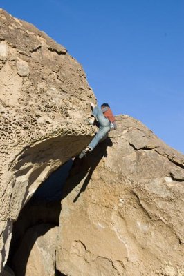 Done With the South V5 at the mouth of the Water Saps cave, Bishop.