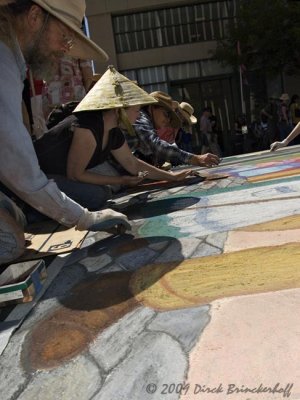 Many Hands at Work --  Cooperating to finish before the deadline.