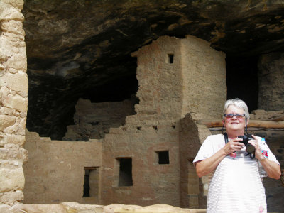 Phyllis taking in the pueblo at Mesa Verde NP tw.jpg