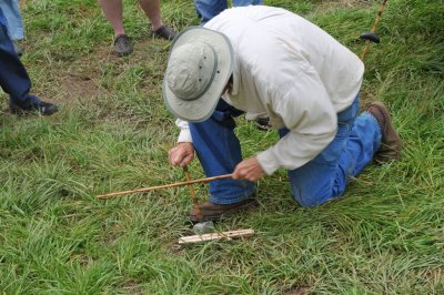 Roger demonstrates primative drilling using a bow and stone drilling point