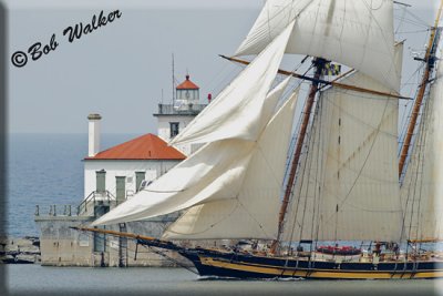 The Pride Of Baltimore Passes In Front Of Oswego Lighthouse