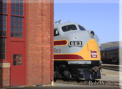 Delaware, Lackawanna & Western Railroad Engine 663 F3 EMD Unit Alongside Building