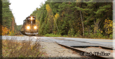The Excursion Train Passes Through The Route 86 Crossing