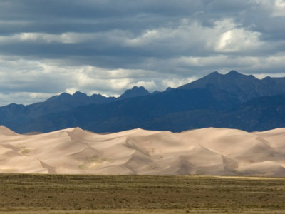 Great Sand Dunes NM flanked by the Sangre De Cristo Mountains 1