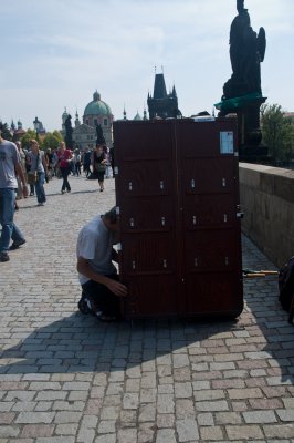 vendor setting up on the charles bridge
