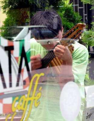 IMG_9981 Jose Luis plays Hey Jude on Pan Flute Feb 11