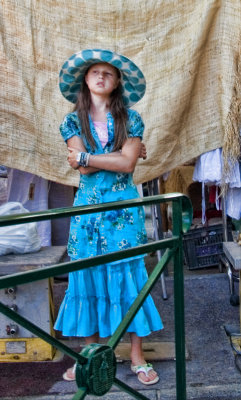 Girl in blue hat