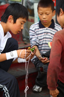 Examining the watermelon car. Tibet