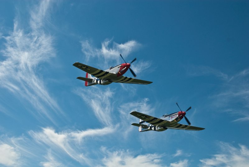 Two P-51s in Flight