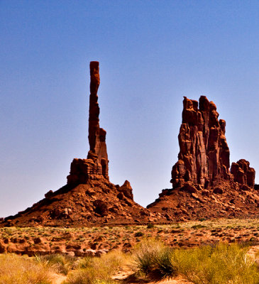 The tall structure on the left is called Totem Pole
