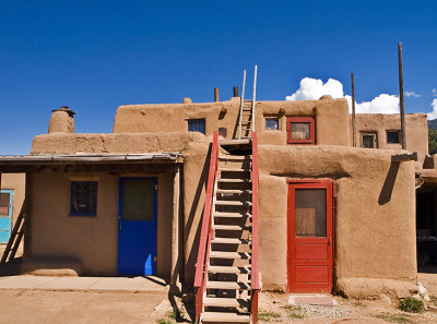 A two story adobe structure