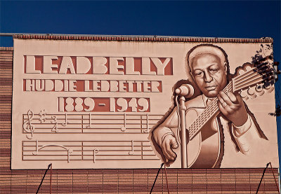 A closeup of the Lead Belly painting.