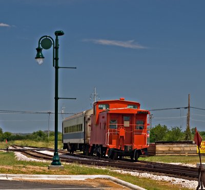 A  view  of the exhibit cars parked at the Llano , TX station